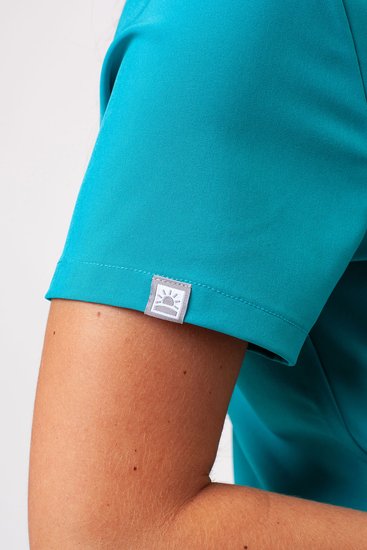 Women's Sunrise Move Pulse scrub top teal blue-5