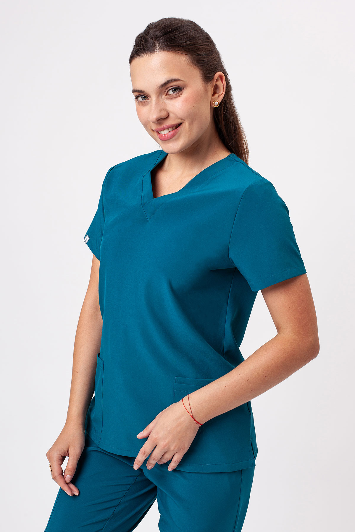 Women's Sunrise Move Pulse scrub top caribbean blue